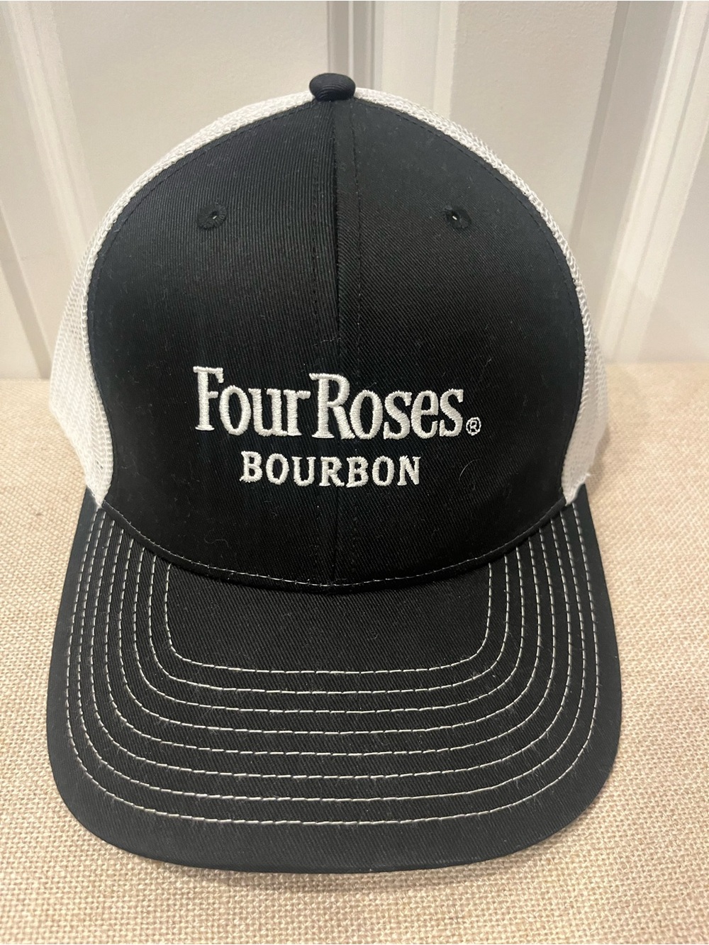 PRE-OWNED FOUR ROSES BOURBON BLACK AND WHITE TRUCKER HAT